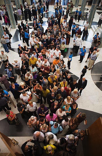 photo of group of people entering the great hall of parliament house in canberra for the purposes of hearing the apology to the forgotten australians in 2009.