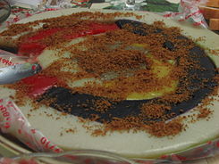 http://upload.wikimedia.org/wikipedia/commons/thumb/1/16/sapin-sapin_with_sprinkled_with_crumbs.jpg/245px-sapin-sapin_with_sprinkled_with_crumbs.jpg