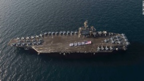 flag on the flight deck of the nimitz-class aircraft carrier uss ...