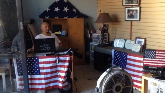 hector barajas sits at his computer desk at the deported veterans support house in tijuana, mexico.