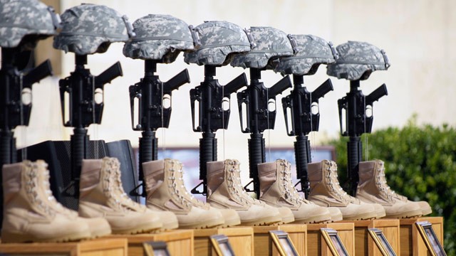 photo: a memorial to victims of the fort hood shooting is shown before the start of a memorial service, to be attended by president barack obama, at fort hood, texas, nov. 10, 2009.