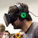 erk huelague plays with a virtual-reality gaming system at the game developers conference.